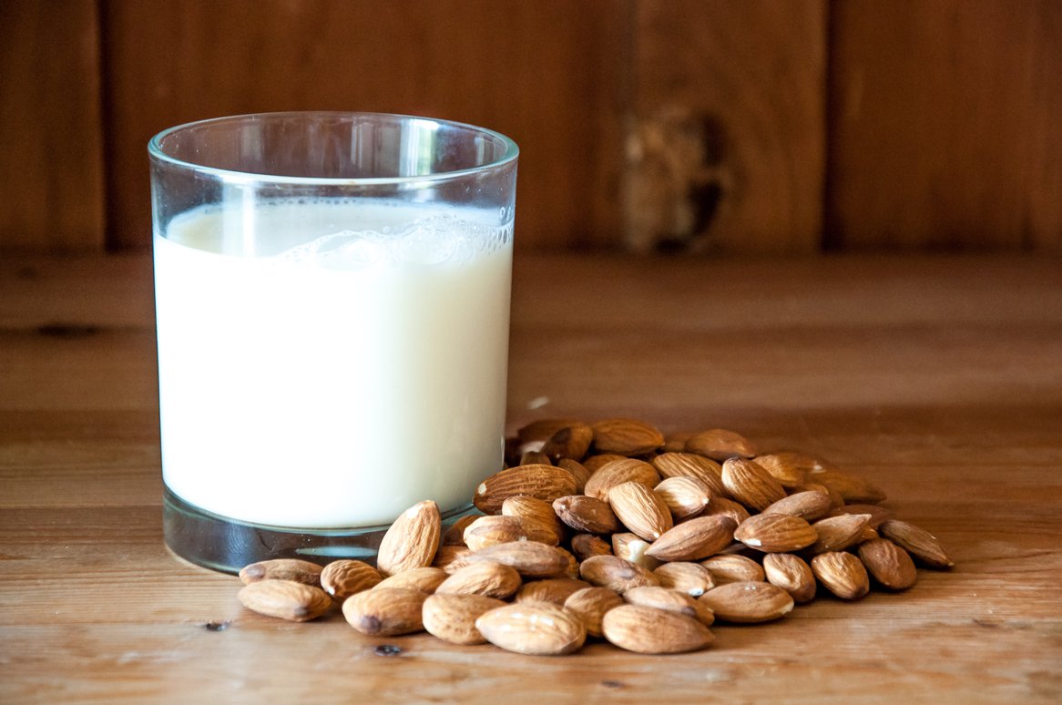 stockvault-almond-milk-with-almonds-on-wood171161.jpg
